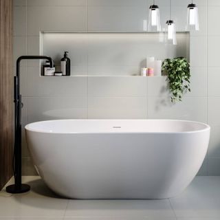 white freestanding modern bath with tall back floor mounted tap to side