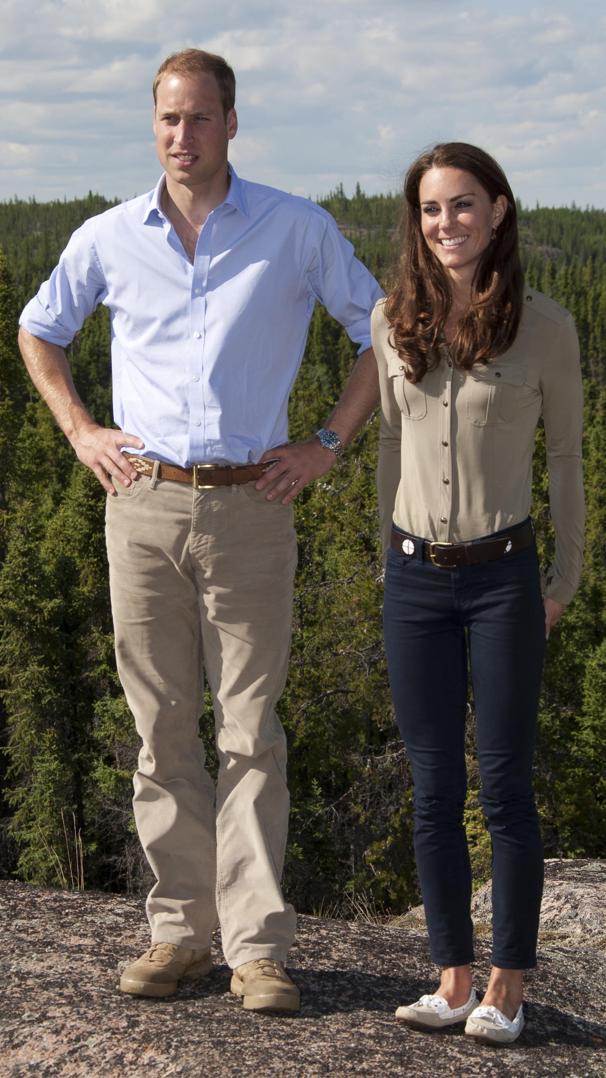 Prince William and Kate stand on a clifftop during their visit to Canada