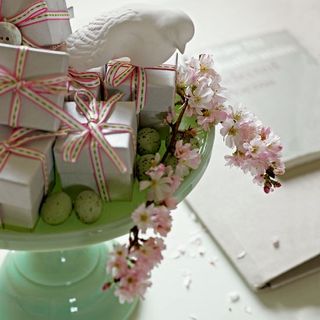 small white boxes with pink flowers