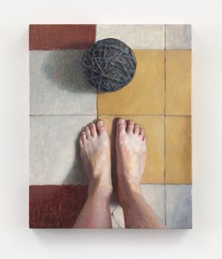 painting of feet on tiled floor with ball of wool