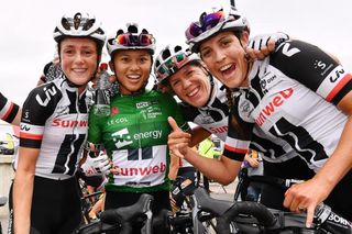 Coryn Rivera and teammates celebrate her overall victory at the OVO Energy Women's Tour