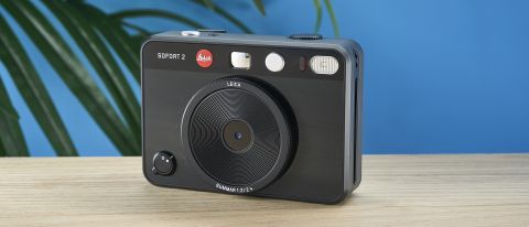 A black Leica Sofort 2 hybrid instant camera