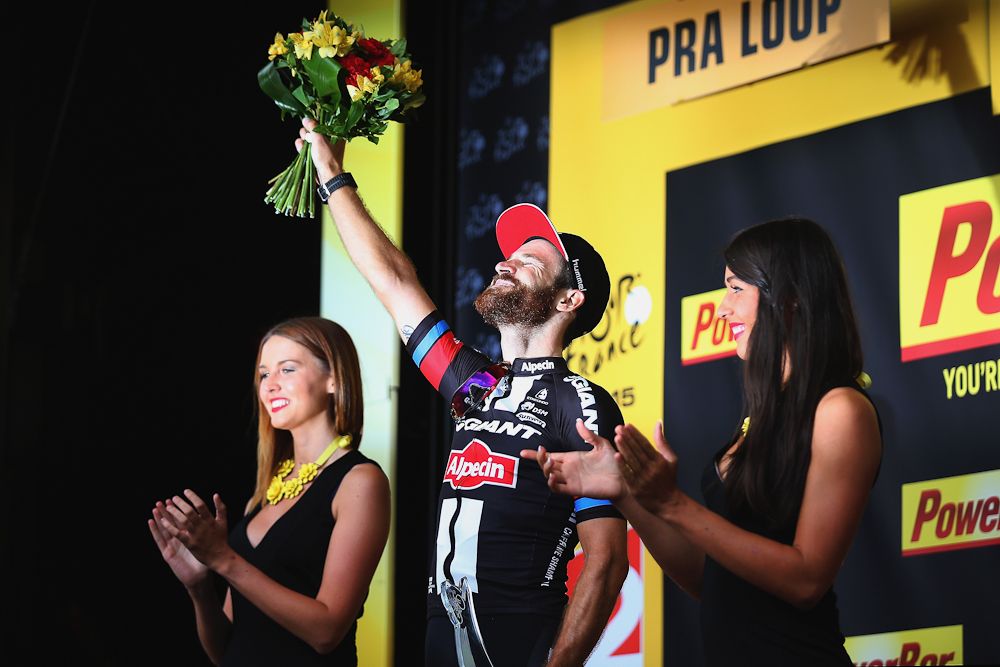 Simon Geschke soaks in the podium atmosphere after his stage 17 win.