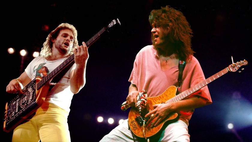 Rock musicians Michael Anthony and Eddie Van Halen (1955 - 2020), both of the group Van Halen, perform onstage.