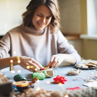 Woman Wrapping Gift