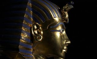 The gold burial death mask of Tutankhamun honored the young pharaoh after his untimely death.