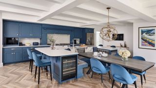 blue kitchen with painted white beams