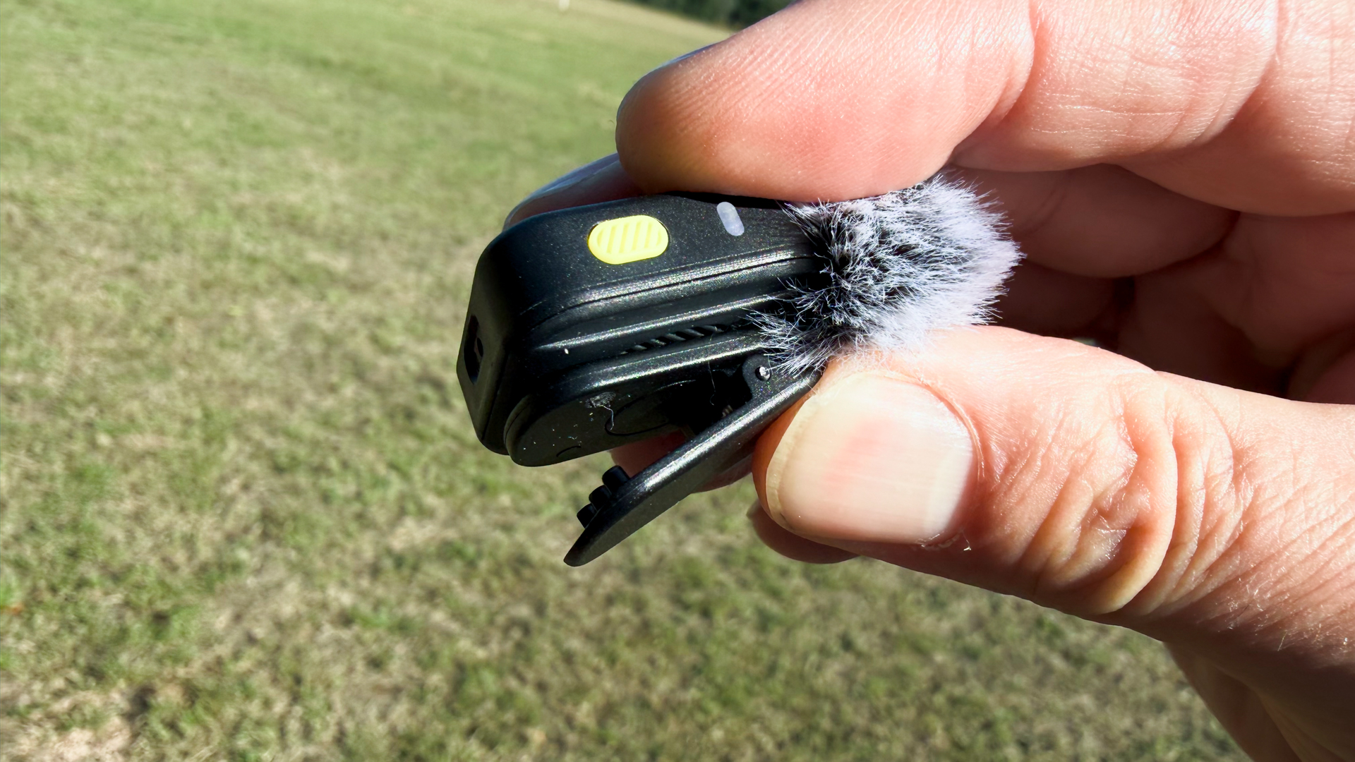 The magnetic attachment also features a spring clip, so you can attach the transmitter to a shirt or jacket lapel.