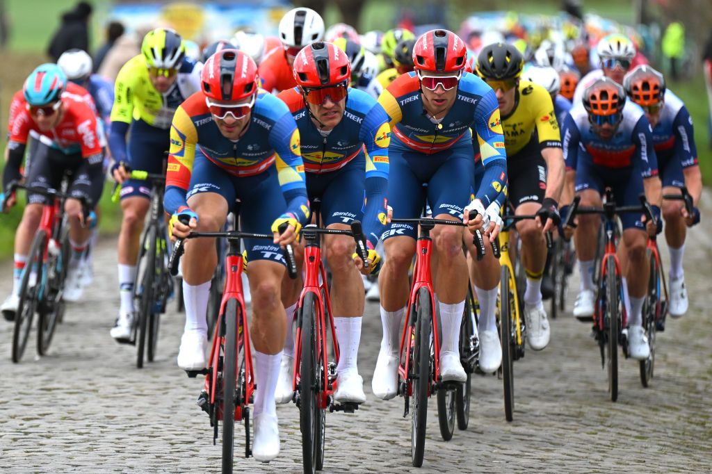 WAREGEM BELGIUM MARCH 27 LR Jasper Stuyven of Belgium and Jonathan Milan of Italy and Team Lidl Trek compete during the 78th Dwars Door Vlaanderen 2024 Mens Elite a 1886km one day race from Roeselare to Waregem UCIWT on March 27 2024 in Waregem Belgium Photo by Tim de WaeleGetty Images