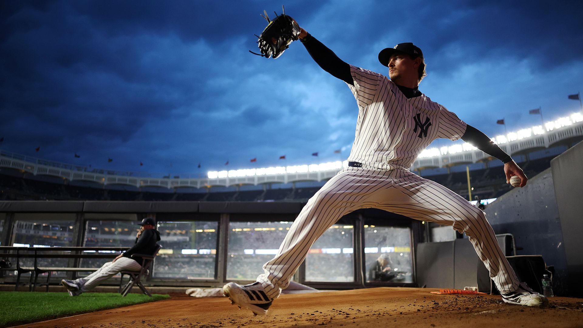 Max Fried #54 of the New York Yankees warms up in the bullpen before a game against the Tampa Bay Rays at Yankee Stadium in New York, United States
