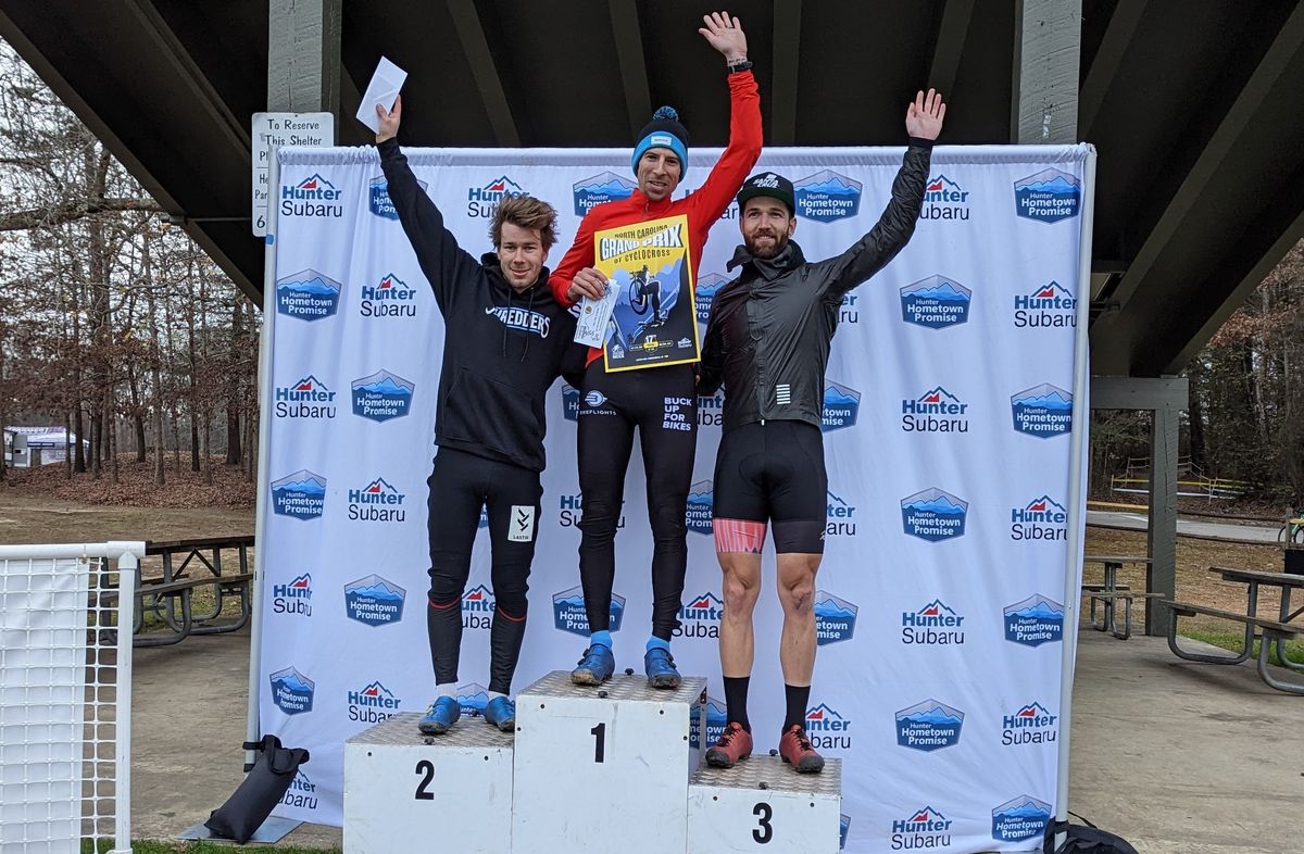 Elite men&#039;s podium day one of 2022 North Carolina Grand Prix (L to R): Tyler Orschel second, winner Kerry Werner, Tobin Ortenblad third