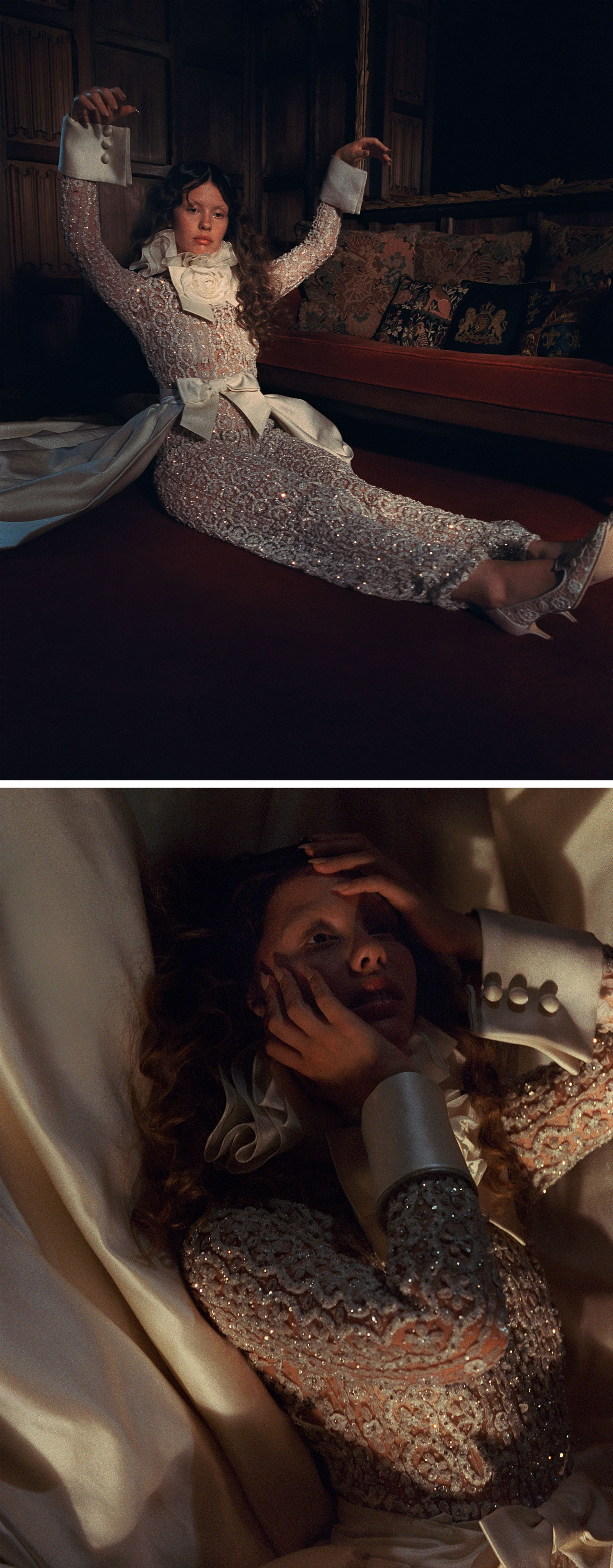 Mia Goth photo shoot for Who What Wear&#039;s October Cover Story. She is sitting on the ground next to a velvet coach wearing a white crystal-embellished jumpsuit with stain bow detailing and ruffled collar.
