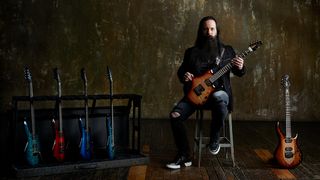 John Petrucci with his new Ernie Ball Music Man 20th anniversary signature models