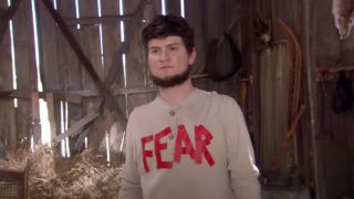 Dwight's cousin Mose in a shirt that reads "FEAR"