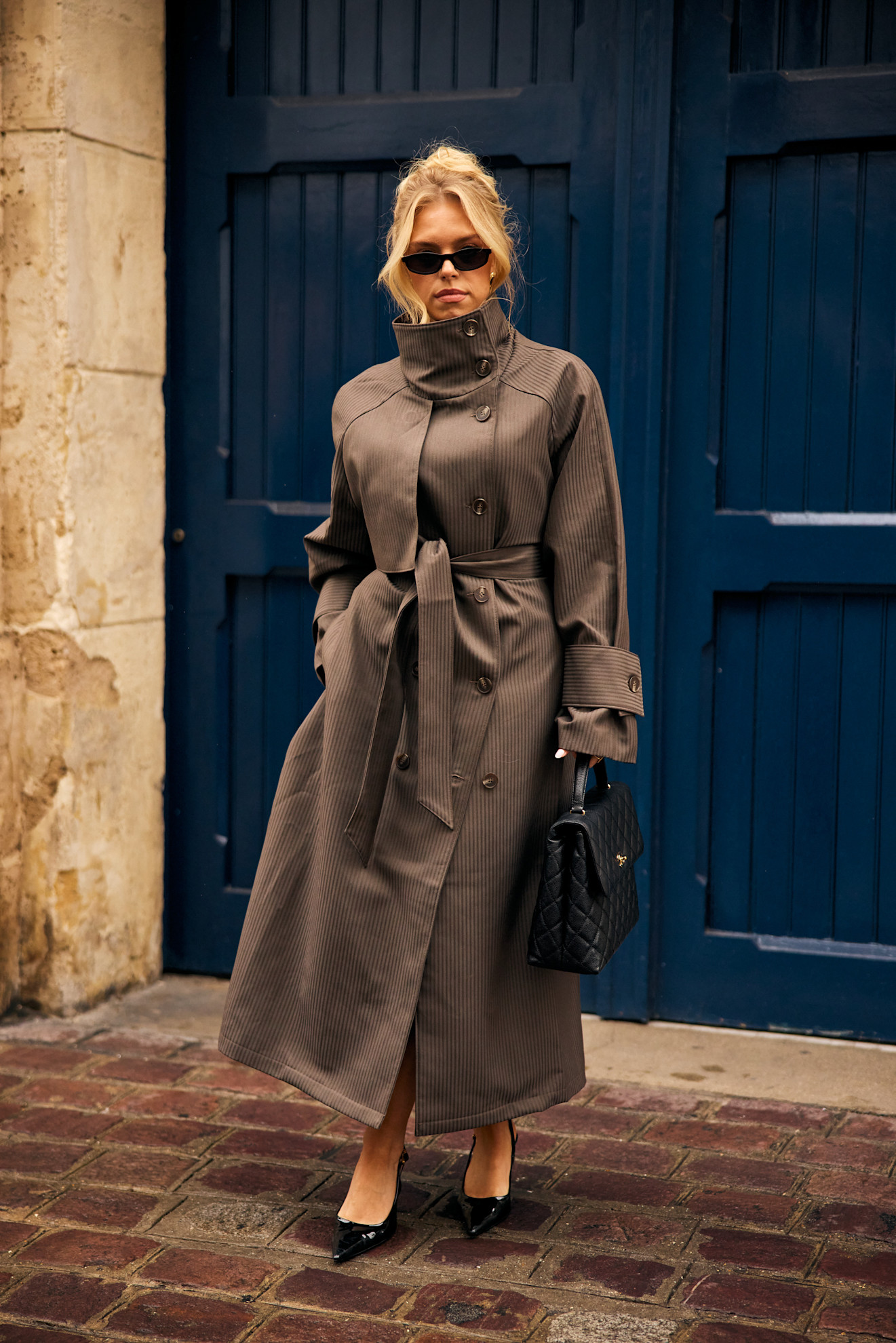 French girls wearing trench coats for fall at Paris Fashion Week