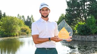 Angel Ayora with the Rosa Challenge Tour trophy