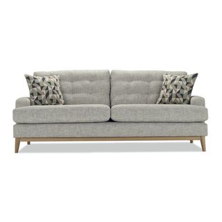 silver colour sofaset with printed cushions