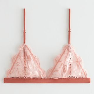 bras vs bralettes a pink lace bra with slim shoulder straps from & Other Stories