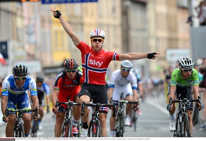 Edvald Boasson Hagen gives a lopsided victory salute in 2013