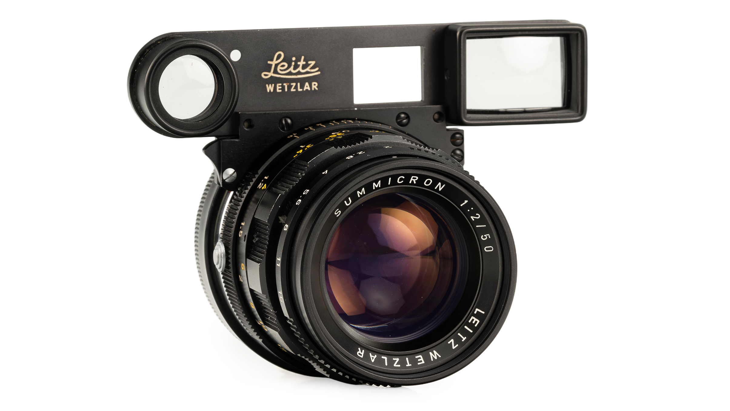 A vintage Summicron 50mm f/2 lens, showcasing its classic design and precision craftsmanship