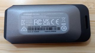 Back of Corsair EX100u portable SSD with information sticker