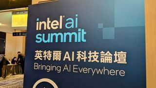 Intel AI Summit 2024 sign.