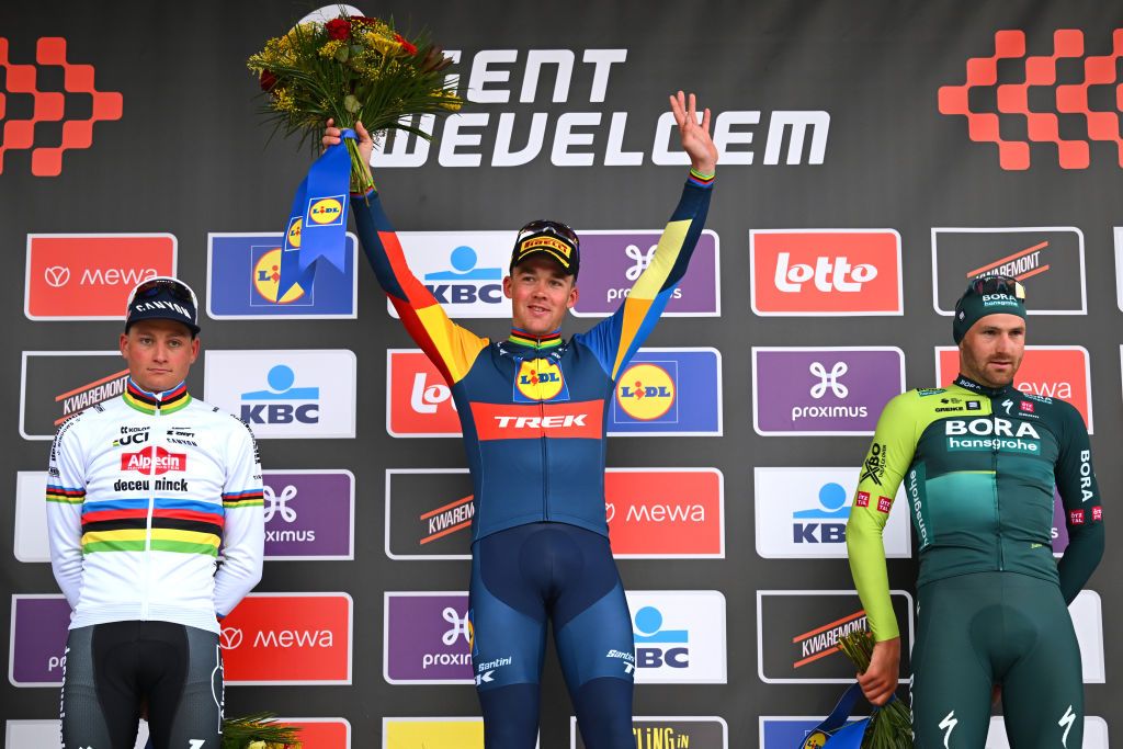 WEVELGEM BELGIUM MARCH 24 LR Mathieu van der Poel of The Netherlands and Team Alpecin Deceuninck on second place race winner Mads Pedersen of Denmark and Team Lidl Trek and Jordi Meeus of Belgium and Team BORA hansgrohe on third place pose on the podium ceremony after the 86th GentWevelgem in Flanders Fields 2024 Mens Elite a 2531km one day race from Ieper to Wevelgem UCIWT on March 24 2024 in Wevelgem Belgium Photo by Tim de WaeleGetty Images