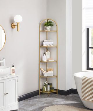 gold corner shelf in a classic style bathroom