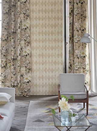 Beige living room with grey and beige and grey floral curtains
