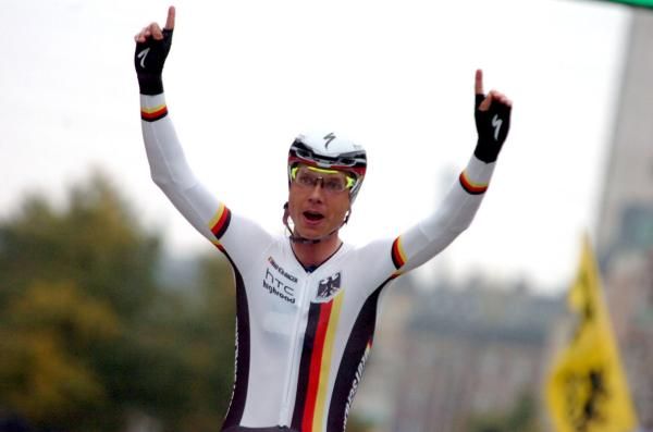 Tony Martin celebrated his TT world title as he crossed the line