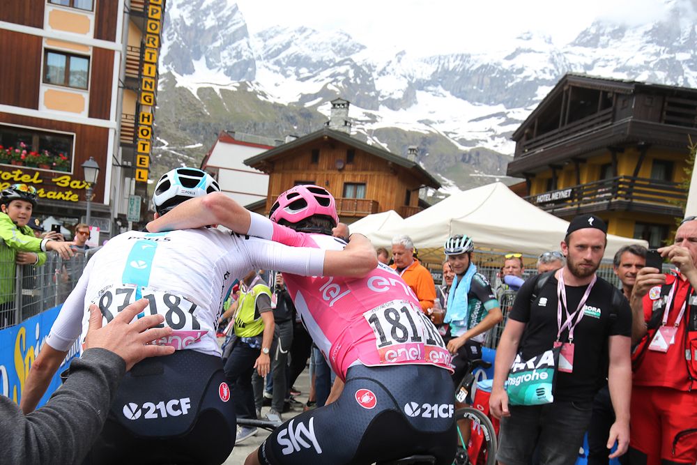 Chris Froome and a teammate celebrate after the Giro's stage 20