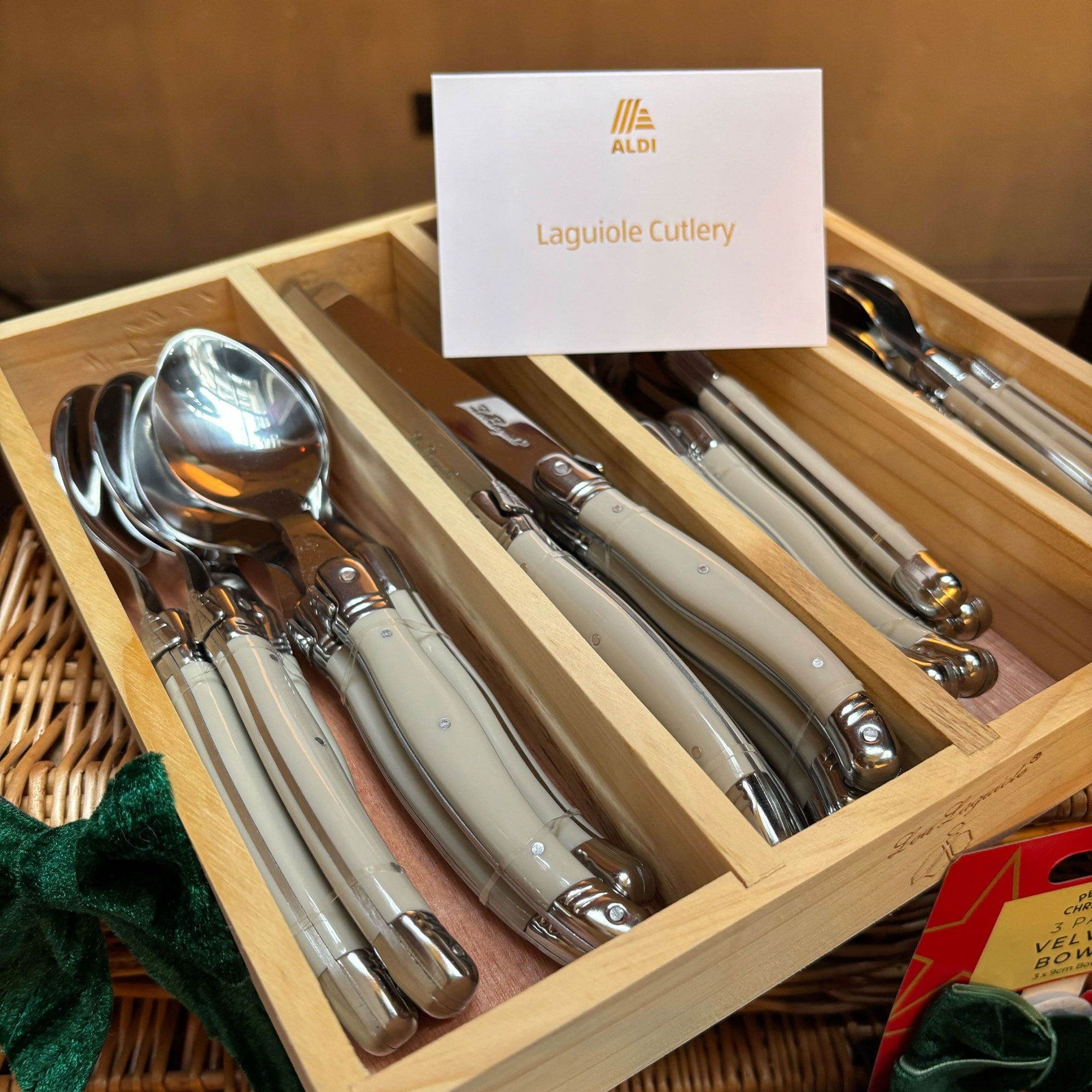Grey cutlery in wooden box