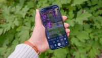 the Shutter Camera Remote App held in a person's hand