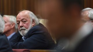 PRETORIA, SOUTH AFRICA - SEPTEMBER 11:(BY COURT ORDER, THIS IMAGE IS FREE TO USE) Reeva Steenkamp's father, Barry Steenkamp sits in the Pretoria High Court on September 11, 2014, in Pretoria,