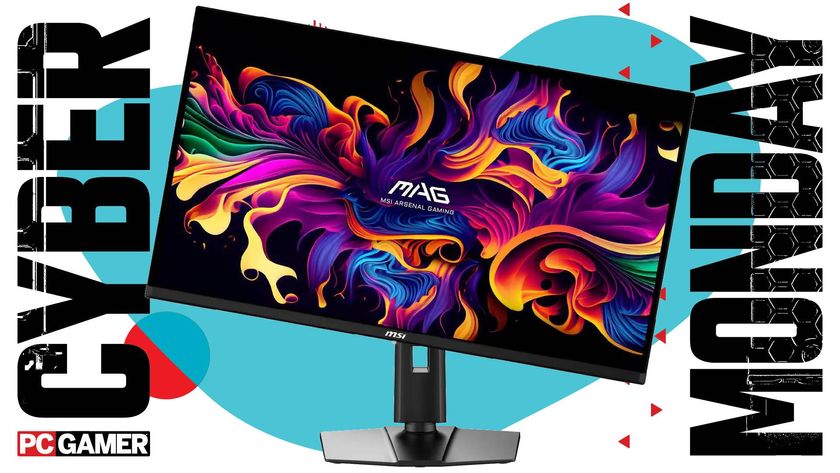 An MSI MAG 321UP gaming monitor on a Cyber Monday background