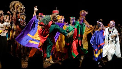 The cast of "The Lion King" on Broadway at the 15th Anniversary celebration at the Minskoff Theatre on November 18, 2012 in New York City