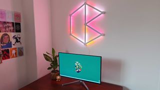 Nanoleaf Lines mounted above gaming desk with monitor on top
