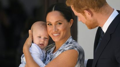 Britain's Prince Harry and his wife Meghan, Duchess of Sussex, holding their son Archie, meet Archbishop Desmond Tutu (not pictured) at the Desmond & Leah Tutu Legacy Foundation in Cape Town, South Africa, September 25, 2019. REUTERS/Toby Melville/Pool