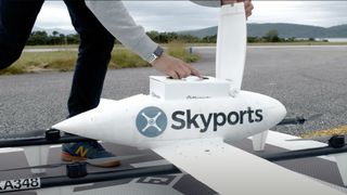School dinner being placed into a Skyports drone for delivery