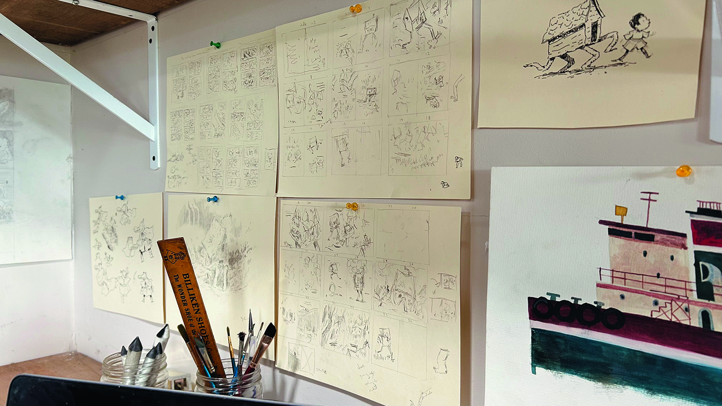Sketches on a wall in an art studio