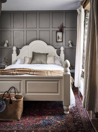 cottage bedroom with gray paneled walls