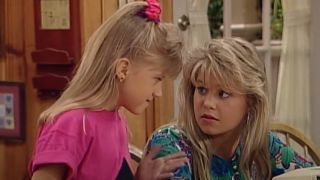 Jodie Sweetin as Stephanie Tanner and Candace Cameron Bure as DJ Tanner on Full House.