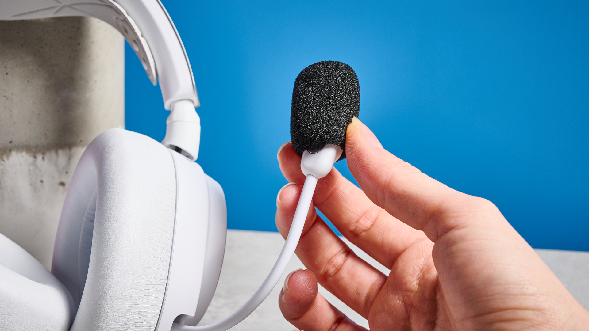 SteelSeries Arctis Nova Pro Wireless mic in hand