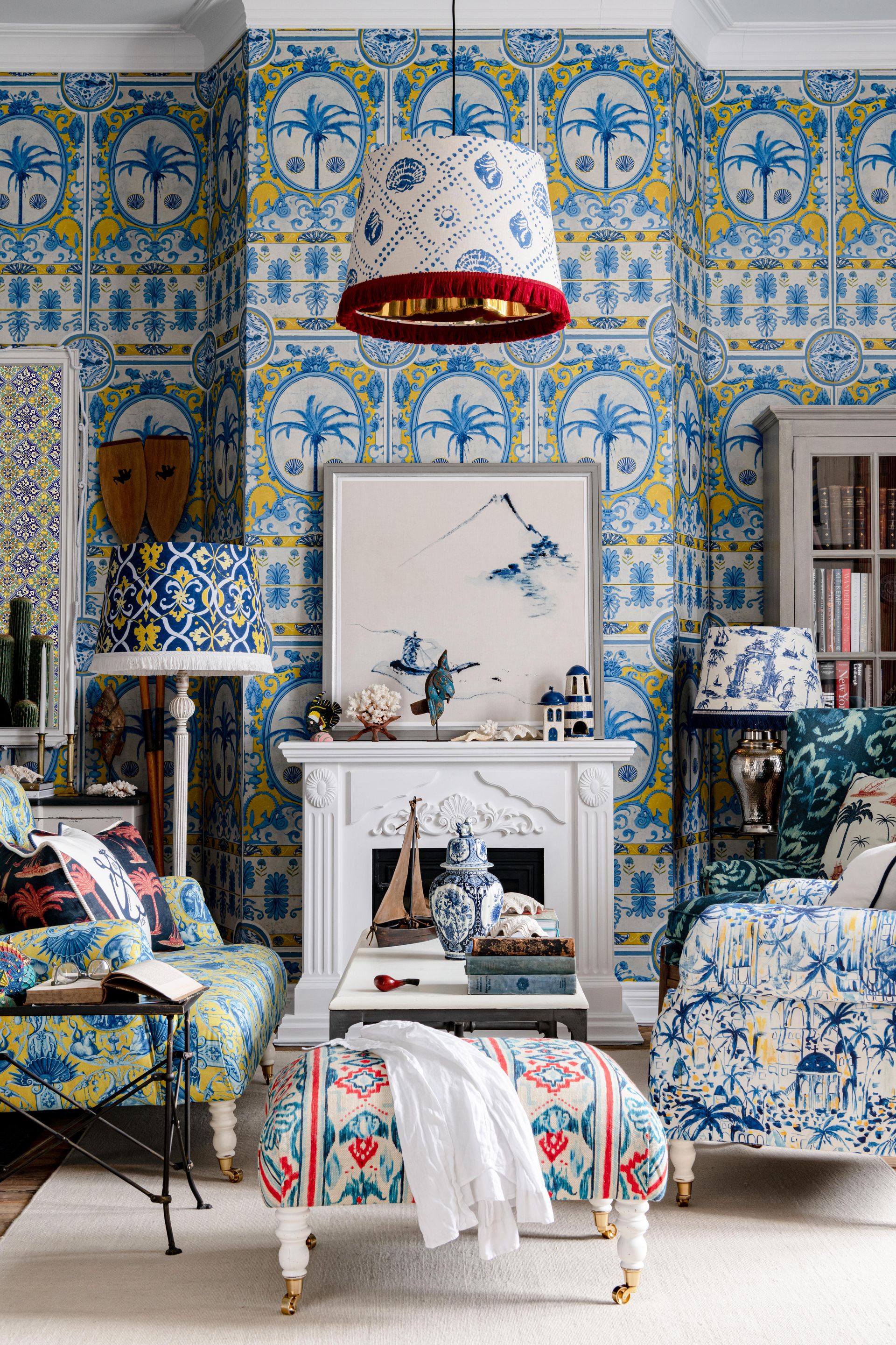 Blue and white living room with multiple decorated lamp shades