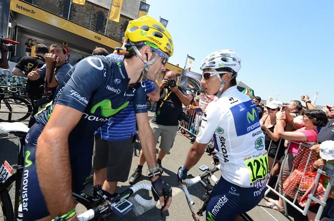 Teammates Alejandro Valverde and Nairo Quintana chat before the stage