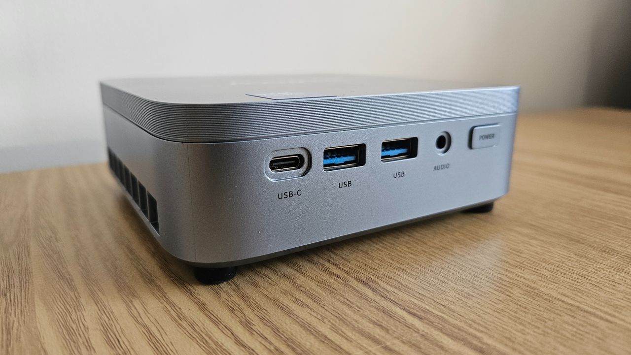 The Acemagic Kron Mini K5 PC on a desk