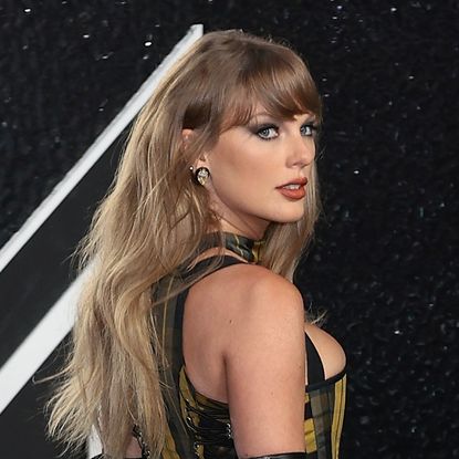 Taylor Swift on the 2024 VMAs red carpet wearing Dior
