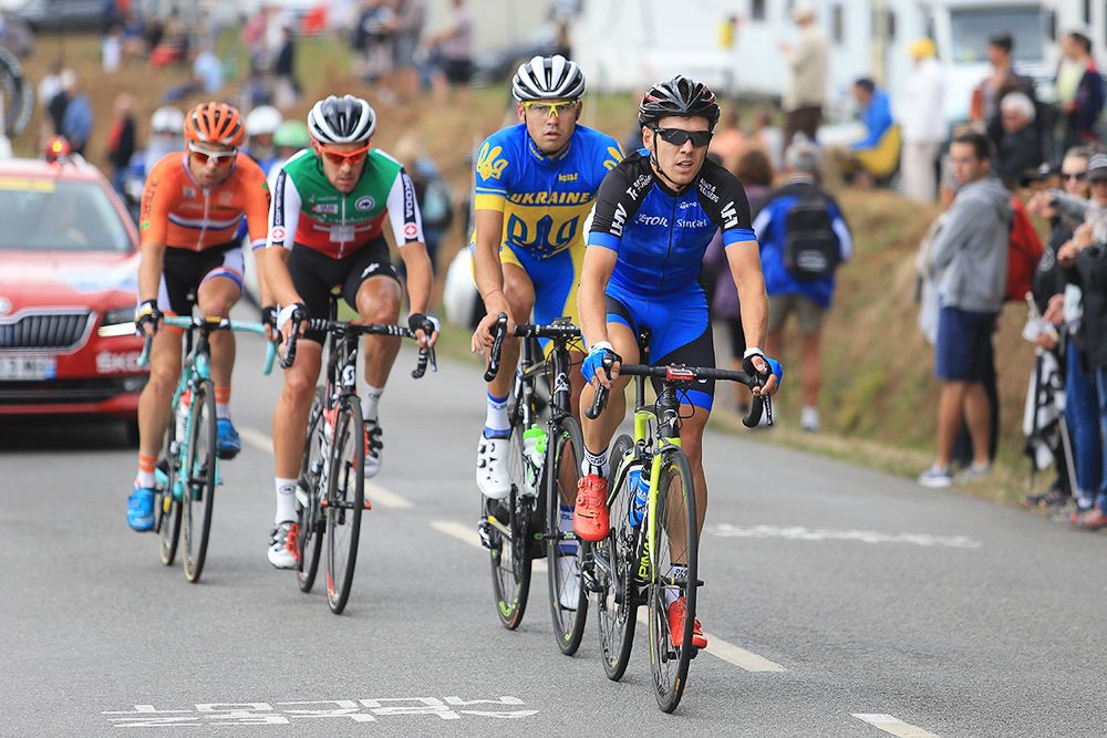 Breakaway riders Risto Raid (Estonia), Andriy Bratashcuk (Ukraine), Pirmin Lang (Switzerland) and Bert-Jan Lindeman.