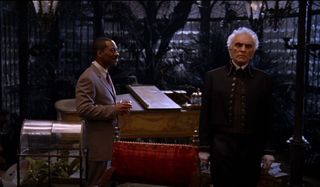 Terrance Stamp and Eddie Murphy in The Haunted Mansion