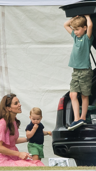 Catherine, Duchess of Cambridge, Prince Louis, Prince George and Princess Charlotte attend The King Power Royal Charity Polo Day at Billingbear Polo Club on July 10, 2019 in Wokingham, England